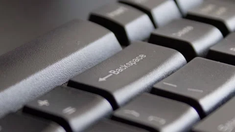 Finger pressing backspace on keyboard Stock Footage 331127010
