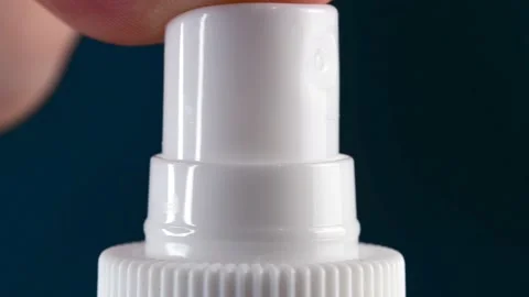 Finger pressing on button on the bottle with liquid soap Stock Footage 150859262