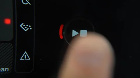 Finger pressing a coffee machine button with a start - pause icon. Break concept Stock Footage 279377269