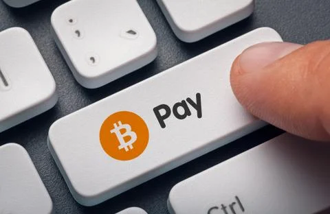 Finger pressing computer key with bitcoin logo and pay word. Stock Illustration