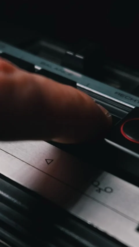 Finger Pressing Control Button on Vintage Audio Player in Close Up Stock Footage 333818981