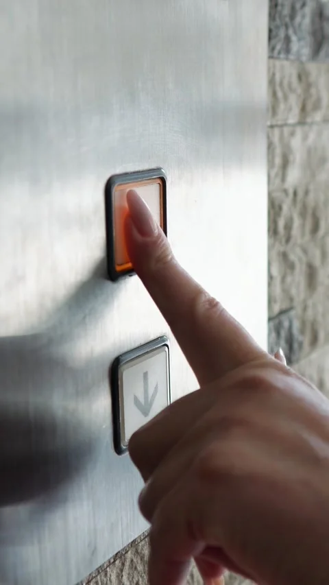 Finger Pressing Elevator Up Button, Travel Ready Moment In Urban Lobby, Closeup Vídeos de archivo 332871196