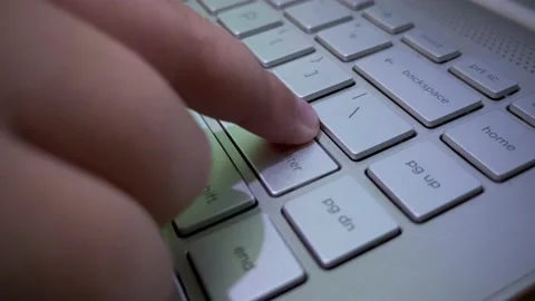 Finger pressing Enter button on laptop keyboard. 4k video 스톡 동영상 155774717