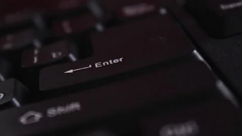 Finger pressing enter key on computer Stock-Footage 203779952