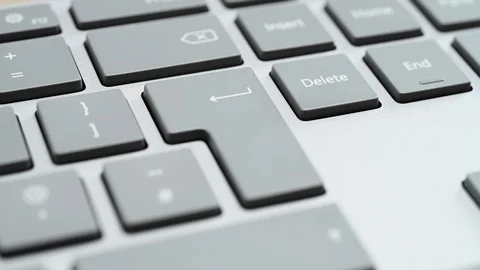 Finger pressing the enter key Stock Footage 124307088