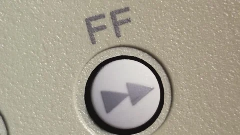 Finger Pressing Fast Forward Button On Vintage Editing Controller Stock Footage 336472423