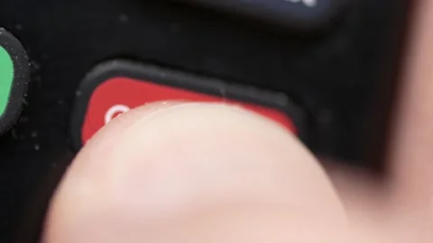 Finger Pressing the Google Play app Button on a TV Remote Control Closeup 스톡 동영상 166703925