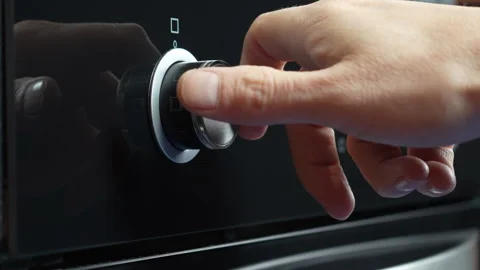 Finger Pressing Illuminated Button in Modern Environment Stock Footage 306849403