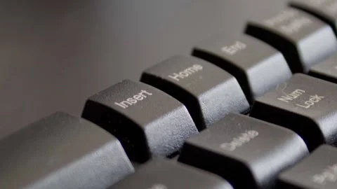 Finger pressing insert on keyboard Stock Footage 331127193