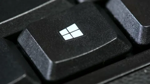 Finger pressing the Microsoft Windows OS logo, operating system key Stock Footage 171330873