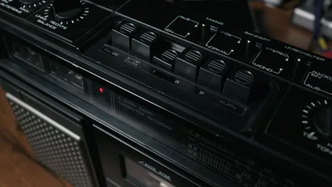 Finger Pressing Play Button on Vintage Black Audio Cassette Player Recorder Stock Footage 334116217