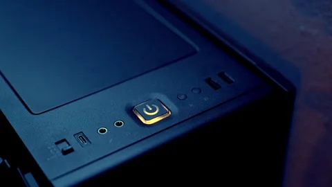 Finger Pressing Power Button on High End Gaming PC - Computer Booting Up Stock Footage 321970168