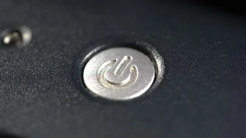 Finger pressing the power button, man turning on a laptop computer, power on Stock Footage 169759735