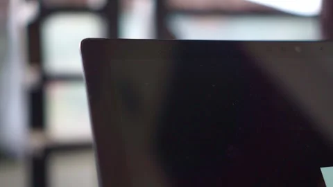 Finger pressing power button on tablet screen, close-up, turning on device, Stock Footage 334118265