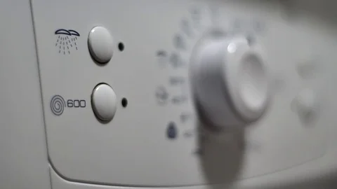 Finger Pressing The Programing Buttons Of A Washing Machine, Detail Video stock 70165465
