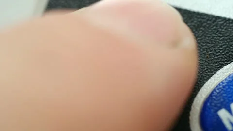 Finger pressing red onoff button Stock Footage 317904924
