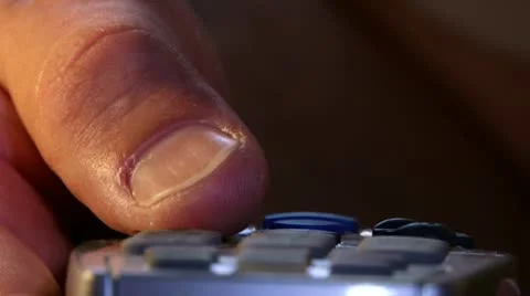 Finger pressing remote control. Stock Footage 20511311