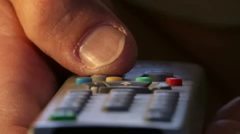 Finger pressing remote control. Stock Footage 20511312