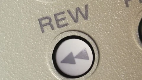 Finger Pressing Rewind Button On Vintage Editing Controller Stock Footage 336472415