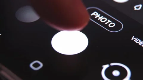Finger pressing shutter button for long exposure night mode in low light Stock-Footage 158370291