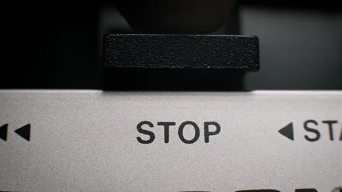 Finger Pressing Start Button on Silver Device Stock Footage 319585014