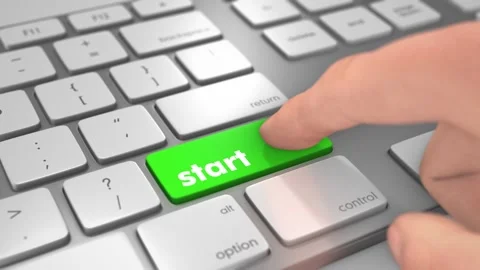 Finger pressing Start Keyboard Button Stock Footage 241634321