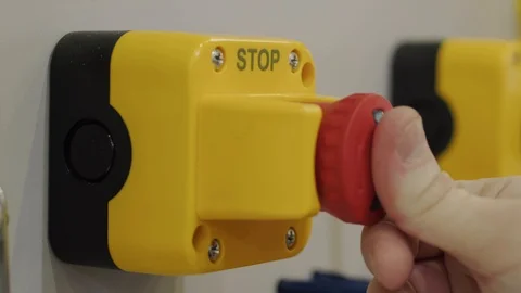 Finger pressing stop button, hand reset emergency signal Stock Footage 105076907