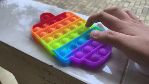Finger pressing touching pop it antistress toy. trending game. shot in 4k 스톡 동영상 155761196