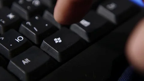 Finger pressing Windows button  스톡 동영상 69860419