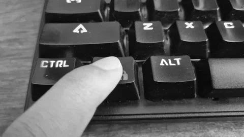 Finger pressing the Windows lock key on a mechanical keyboard Stock Footage 339017713