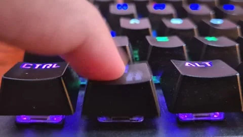 Finger pressing Windows logo key on keyboard. Stock Footage 339243098