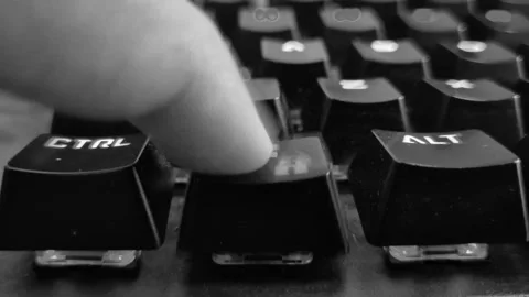 Finger pressing Windows logo key on keyboard Stock Footage 339243101
