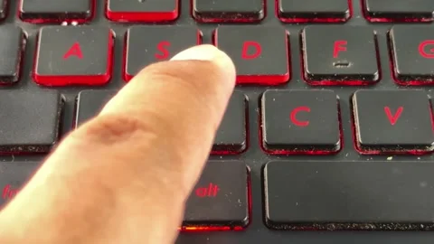 Finger pressing "X" keyboard button, perfect for technology, data entry, Stock Footage 334117096