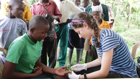 Finger-prick test for HIV in Uganda, Africa. Stock Footage 96176217