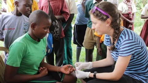 Finger-prick test for HIV in Uganda, Africa. Stock Footage 96176238