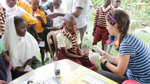 Finger-prick test for HIV in Uganda, Africa. Stock Footage 96176717