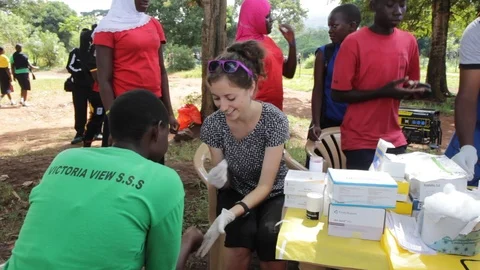 Finger-prick test for HIV in Uganda, Africa. Stock Footage 96380935