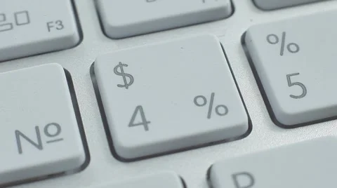 Finger Push $4%, 5% Buttons of the Macbook Keyboard. Close up slow panorama. Stock Footage 50474337