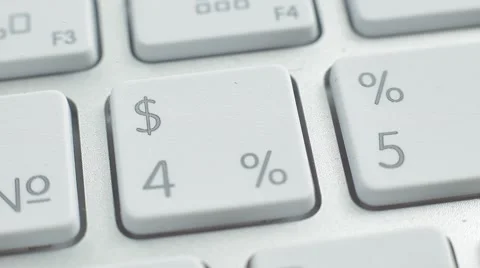 Finger Push $4%, 5% Buttons of the Macbook Keyboard. Close up slow panorama. Stock Footage 50474384