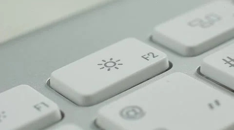 Finger Push F2 (sun), 3#№ Buttons of the Keyboard. Close up slow panorama Stock Footage 50474628