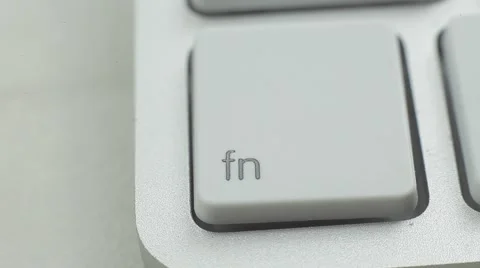 Finger Push Function Modifier (fn) Key Button of the Keyboard. Close up Stock Footage 50474740
