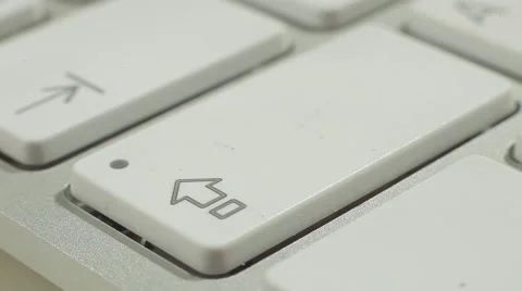 Finger Push Shift Button of the Macbook Keyboard. Close up slow panorama. Stock Footage 50474396