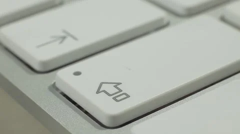 Finger Push Shift Button of the Macbook Keyboard. Close up slow panorama. Stock Footage 50474478