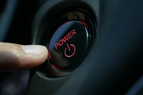 Finger push start power engine system button of electric vehicle car Stock Photos