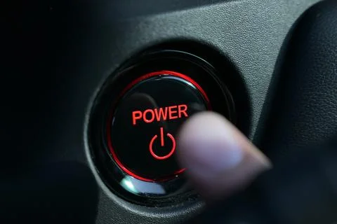 Finger push start power engine system button of electric vehicle car Stock Photos