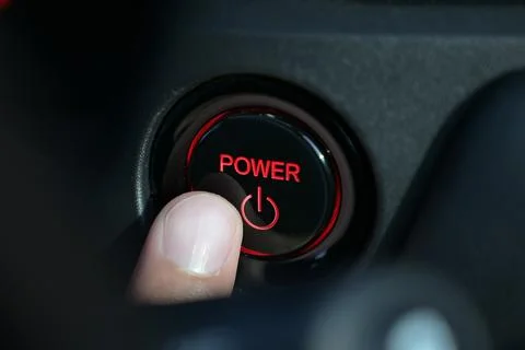 Finger push start power engine system button of electric vehicle car Foto stock