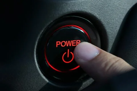 Finger push start power engine system button of electric vehicle car Stock Photos