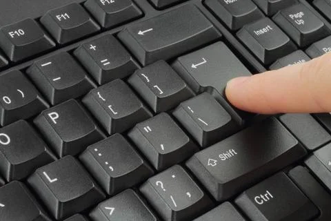 Finger pushing the button Stock Photos