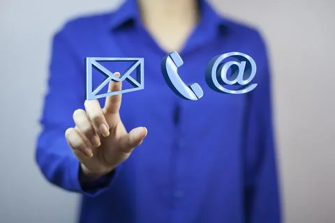 Finger pushing button of send an email on the interface. Stock Photos