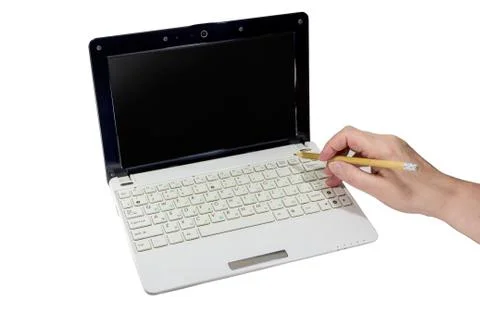 Finger pushing enter button on laptop Foto stock